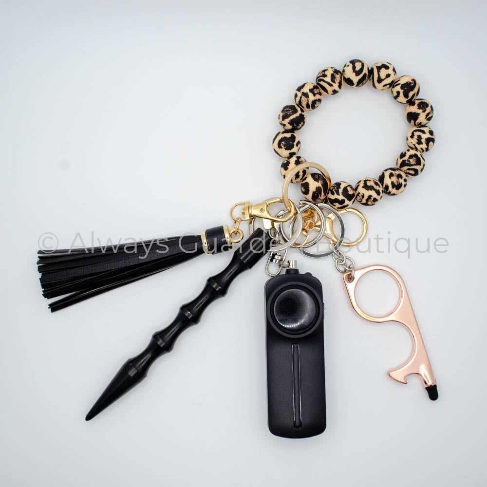 New Year's Guardian Safety Keychain with Leopard Print Wristlet and Stylish Black Tassel