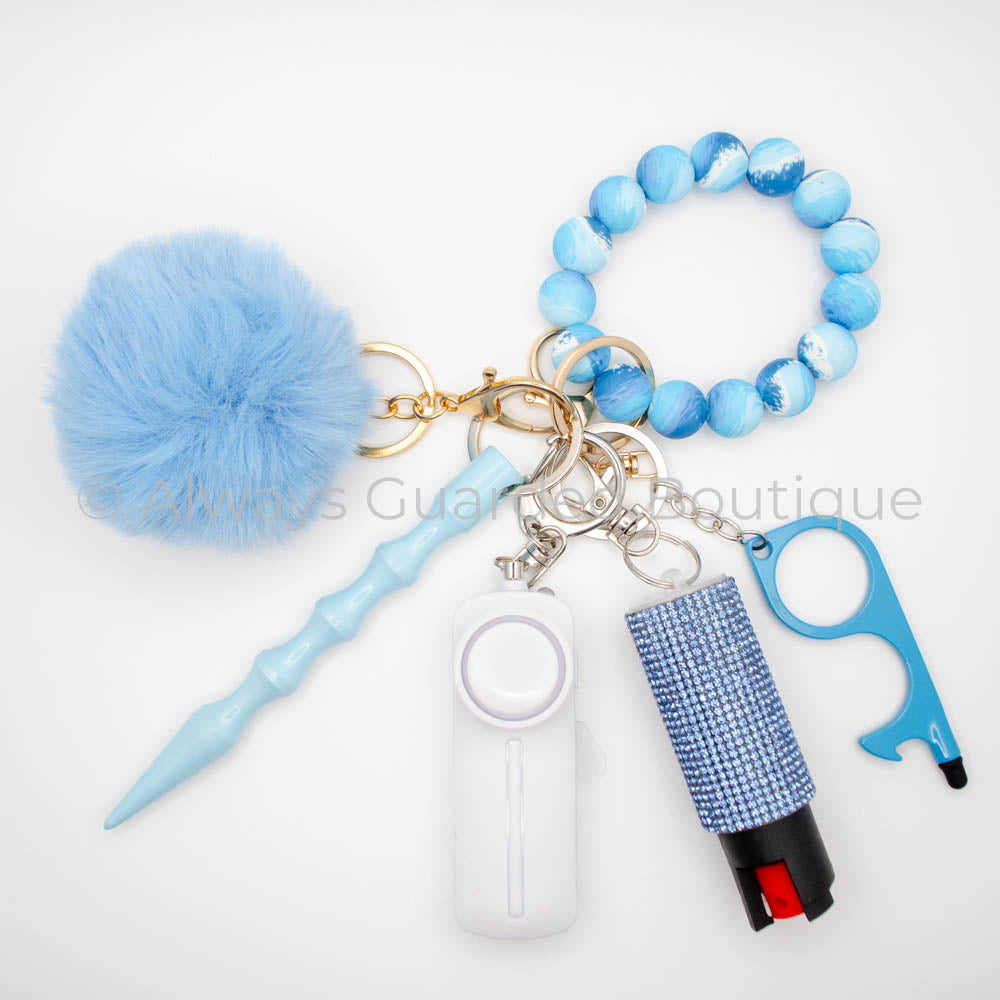 Ocean Waves Safety Keychain with Waves Print Wristlet and Blue Faux Fur Pom Pom with Optional Rhinestone Pepper Spray
