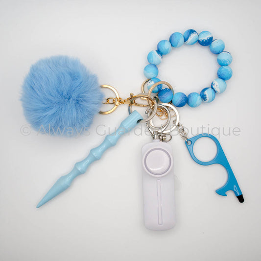 Ocean Waves Safety Keychain with Waves Print Wristlet and Blue Faux Fur Pom Pom